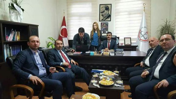 Artvin Milletvekili Dr. İsrafil KIŞLA, İl Milli Eğitim Müdürü Abdulcelil KAHVECİyi  Ziyaret Etti.